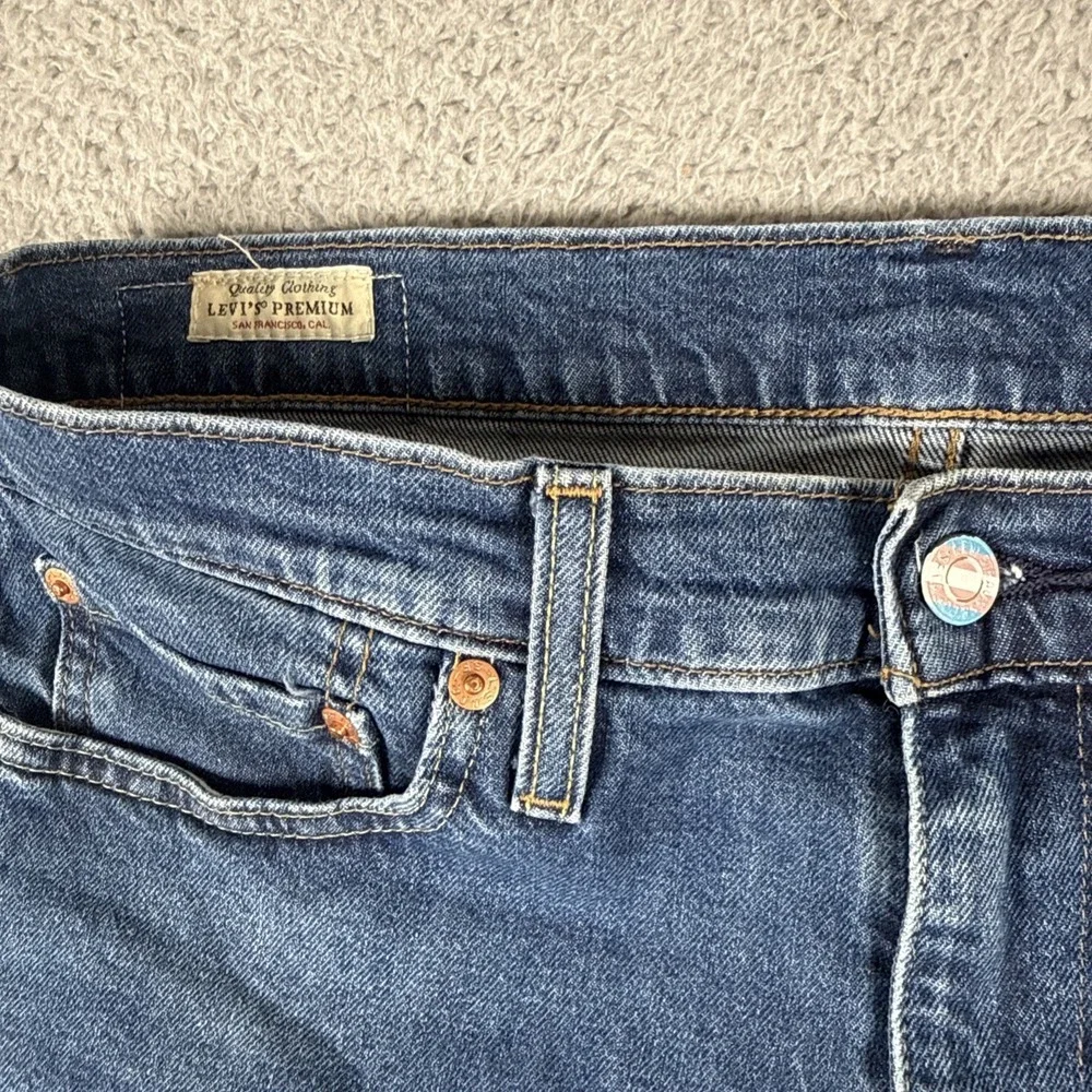 Levi's Slim Straight Dark Blue Jeans with Trans Pride Patch
